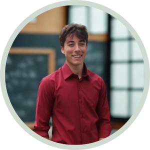 Portrait of English tutor Charles Turner against a classroom backdrop